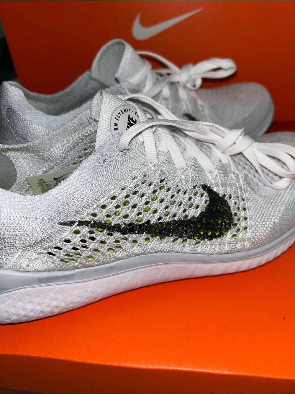 Nike White Flyknit Sneakers with Black and white Swoosh - Picture 2 of 8